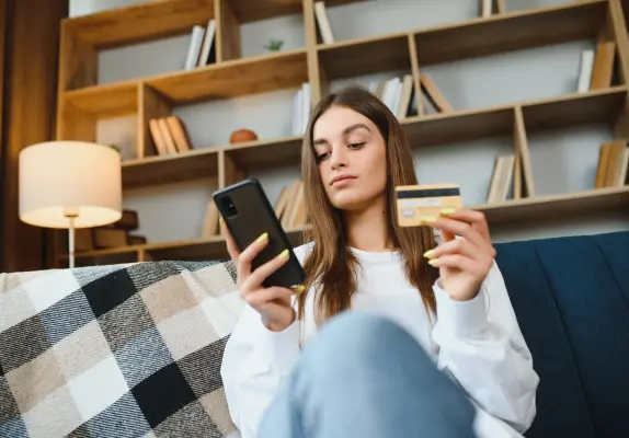 women holding credit card
