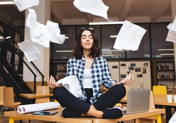 women doing yoga in office